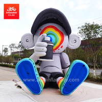 Custom products outdoor huge inflatable cartoon colorful pianting Graffiti boy sitting ontheground for advertising